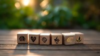 Wooden dice with nature symbols and heart shape arranged in row on rustic table with blurred bokeh background and sunlight, eco-friendly concept.