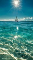 Sailboat drifting on crystal clear turquoise ocean water with sunlight creating sparkles on rippling surface and sandy bottom visible beneath tranquil tropical waves.