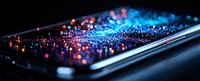 Modern smartphone screen with glowing blue and pink bokeh light effects floating above display surface in dark environment, creative technology concept.