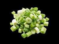Chopped green onions pile isolated on transparent background, ready for food design, recipe cards, stickers, print on demand, T-shirts, and culinary clipart use.
