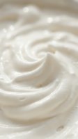 Creamy white swirled texture with smooth flowing patterns for bakery, cosmetic and food industry applications.