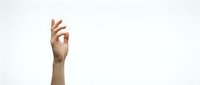 Caucasian male hand raised up showing OK gesture isolated on white background, copy space for text or design elements.