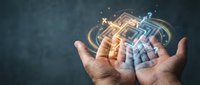 Two hands holding glowing digital holographic circuit board with light effects, representing technology innovation, artificial intelligence, and future computing solutions.