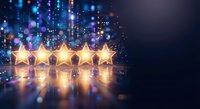 Five golden stars glowing with warm light against sparkling digital bokeh background for rating, review, quality assessment and customer feedback concepts.