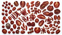 Assorted dried fruits and nuts collection isolated on white background for healthy snacking and culinary ingredients.
