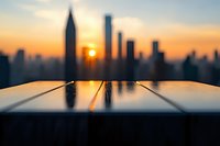 Open book with blank pages against blurred city skyline at sunset, symbolizing new beginnings, education, and urban knowledge opportunities.