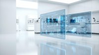 Modern office interior with digital display screens showing data analytics and business metrics on glass panels, suitable for corporate technology, business intelligence, and digital transformation concepts.