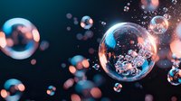 Magical soap bubbles floating in dark space with glowing blue and orange light effects creating dreamy atmosphere. Macro photography with bokeh background.