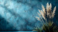 Decorative pampas grass plumes against dramatic dark turquoise background with mystical fog effect and copy space, creating moody atmospheric nature scene.