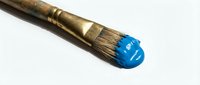 Worn wooden paintbrush with blue paint on bristles against white background, suitable for art, creativity, and craft-related projects.