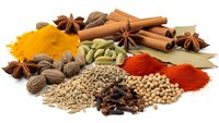 Aromatic spices and seeds collection with turmeric, cinnamon, star anise, cardamom, coriander, paprika isolated on white background for culinary use.