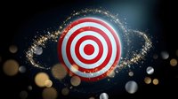 Red and white target bullseye with golden sparkle trail and bokeh lights on dark background for business goals and achievement concepts.