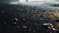 Wet asphalt surface with water droplets and golden light reflections, suitable for backgrounds, textures, and atmospheric design projects.