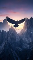 Majestic eagle soaring over dramatic mountain peaks at sunset with purple and pink sky creating inspirational freedom and power concept for motivational content.