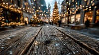 Wooden table surface with blurred Christmas market background featuring warm golden lights and festive decorations for holiday product display and seasonal advertising.