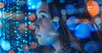Young Asian woman in profile view illuminated by glowing blue and orange bokeh lights creating dreamy atmospheric mood for creative portrait photography.