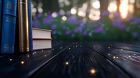 Magical evening scene with old books on rustic wooden table, glowing fireflies and purple wildflowers in soft bokeh background creating dreamy atmosphere.
