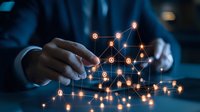 Glowing network nodes connecting in digital space with businessman hands interacting, representing business analytics and data visualization in dark background.