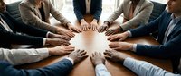 Business team putting hands together in circle showing unity and teamwork collaboration in modern office environment for corporate success.