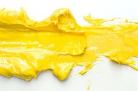 Yellow paint splash with dynamic fluid motion and textured waves creating abstract artistic pattern on white background, suitable for creative design projects.