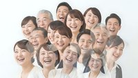 Group of diverse happy people laughing together showing genuine joy and positive emotions on white background for teamwork and community concepts.