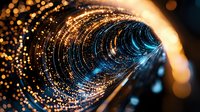 Glowing spiral tunnel with golden and blue light particles creating dynamic motion effect against dark background, abstract cosmic design concept.