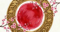 Traditional ornate golden bowl with red liquid and delicate pink cherry blossoms for Asian cuisine, spa wellness, cultural dining and decorative arts.