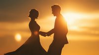 Romantic couple silhouettes holding hands at golden sunset, man and woman in love against warm orange sky creating intimate moment for wedding concepts.