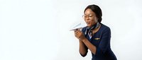 Professional African American businesswoman in navy blazer using smartphone on white background isolated for corporate design and marketing materials.