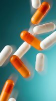 Orange and white pharmaceutical capsules floating against turquoise gradient background for medical healthcare and medication concepts.