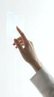 Elegant female hand with index finger pointing upward in white sleeve against clean white background for business presentations and design projects.