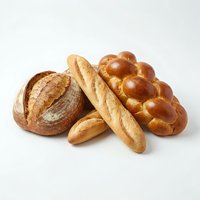 Assorted fresh baked bread loaves and baguettes isolated on white background, ready for bakery, food, and culinary design projects.