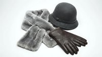Elegant winter accessories set with gray fur scarf, black bowler hat and leather gloves isolated on white background for fashion design projects.