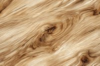 Natural wood grain pattern in light beige tones showing swirling knots and organic flowing lines, suitable for furniture design and interior decor backgrounds.