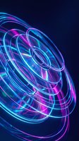 Neon light trails creating dynamic spiral motion with vibrant blue and purple glowing effects on dark background for modern digital design projects.