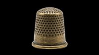 Antique brass thimble isolated on transparent background, ready for sewing clipart, craft stickers, print on demand, sublimation, and t-shirt design use.