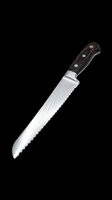 Serrated bread knife with stainless steel blade and black handle, isolated on transparent background, ready for clipart, t-shirt design, and print-on-demand products.