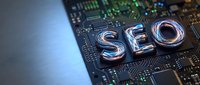 SEO letters on computer circuit board representing search engine optimization and digital marketing technology concepts for web development.