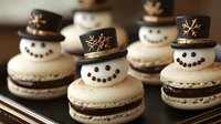 Festive snowman macarons with chocolate hats and smiling faces arranged on baking tray, holiday dessert treats for winter celebrations and Christmas parties.