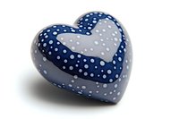 Navy blue and gray heart-shaped decorative object with white polka dot pattern on white background, suitable for Valentine's Day or romantic design elements.
