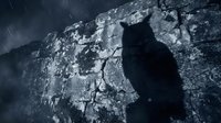 Mysterious human silhouette shadow cast on weathered stone wall during stormy night with dramatic lighting and atmospheric rain effects.