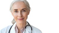 Professional mature female doctor with stethoscope smiling confidently on white background isolated for medical healthcare design applications.