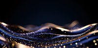 Magical glowing waves with sparkles and bokeh lights on dark background, flowing golden and blue light trails create dreamy abstract pattern.