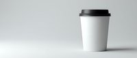 White disposable coffee cup with black lid on clean background for branding mockup and cafe marketing materials.