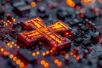 Glowing orange cross shape formed by circuit board components and LED lights, with bokeh effects against dark electronic background. Digital faith concept.