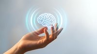 Hand holding a glowing holographic brain with ripple waves, symbolizing artificial intelligence, neuroscience, and digital innovation.