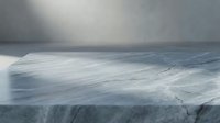 Dramatic arctic landscape with frozen ice field under moody gray sky with sunbeam breaking through clouds creating atmospheric winter scene for nature photography.