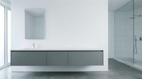 Modern minimalist bathroom interior with floating vanity, glass shower and clean white walls for contemporary home design projects.