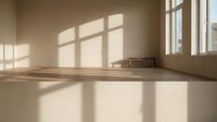 Empty minimalist room with warm sunlight streaming through large windows casting geometric shadows on polished wooden floor for interior design concepts.
