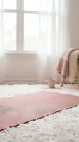 Serene bedroom interior with pink yoga mat on cream carpet, natural light from window, cozy chair with blanket, and minimalist decor for wellness and home design projects.